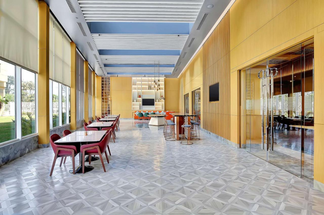 Radisson Red Chandigarh Mohali Exterior photo The Lounge at the airport