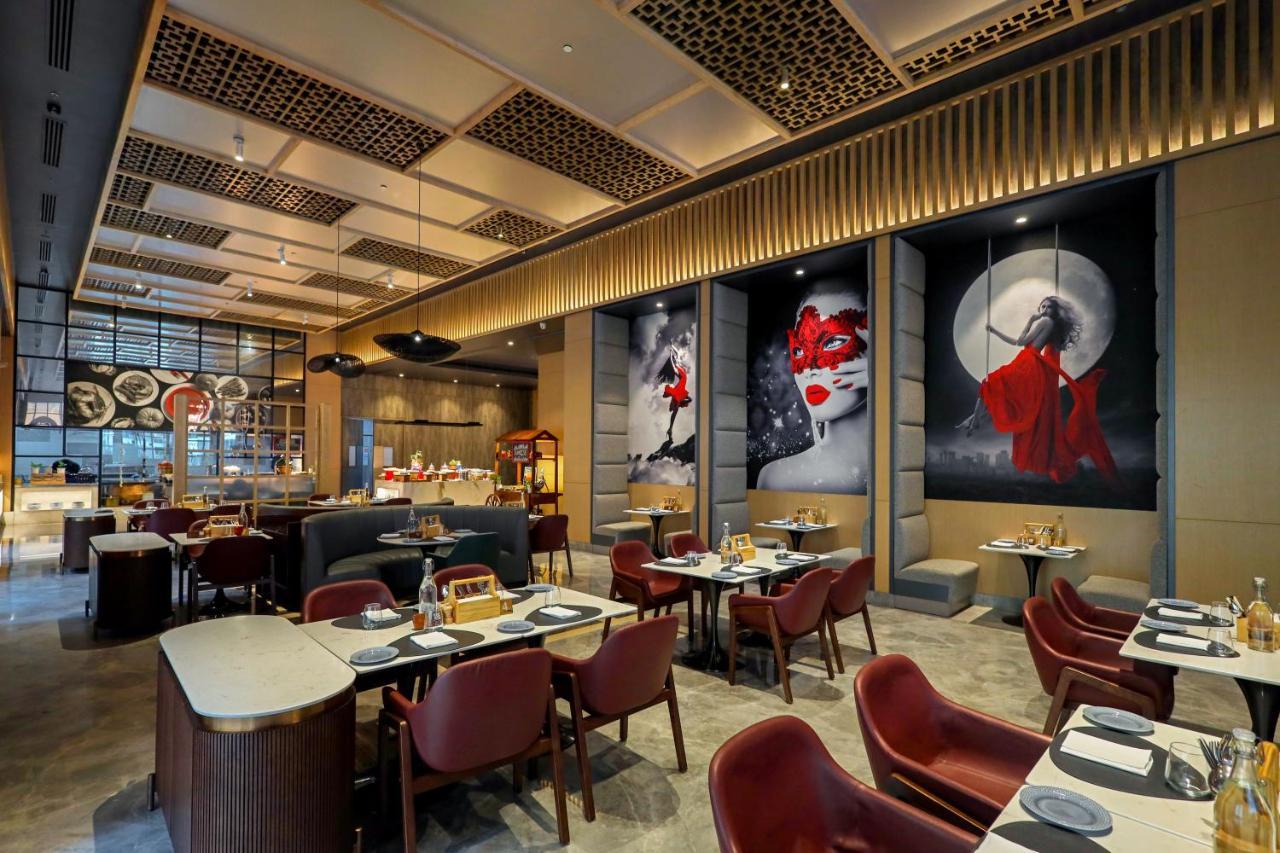 Radisson Red Chandigarh Mohali Exterior photo The interior of the restaurant