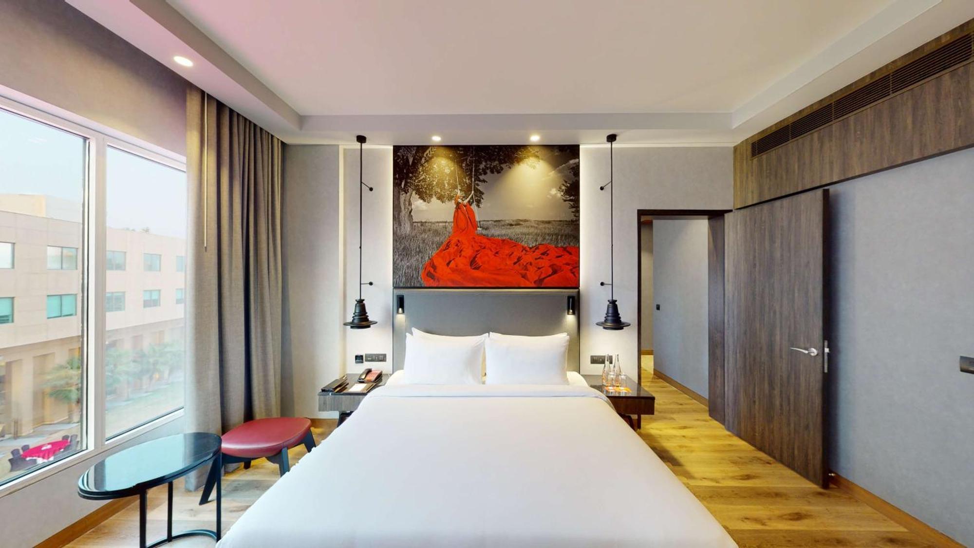 Radisson Red Chandigarh Mohali Exterior photo A bedroom at the hotel