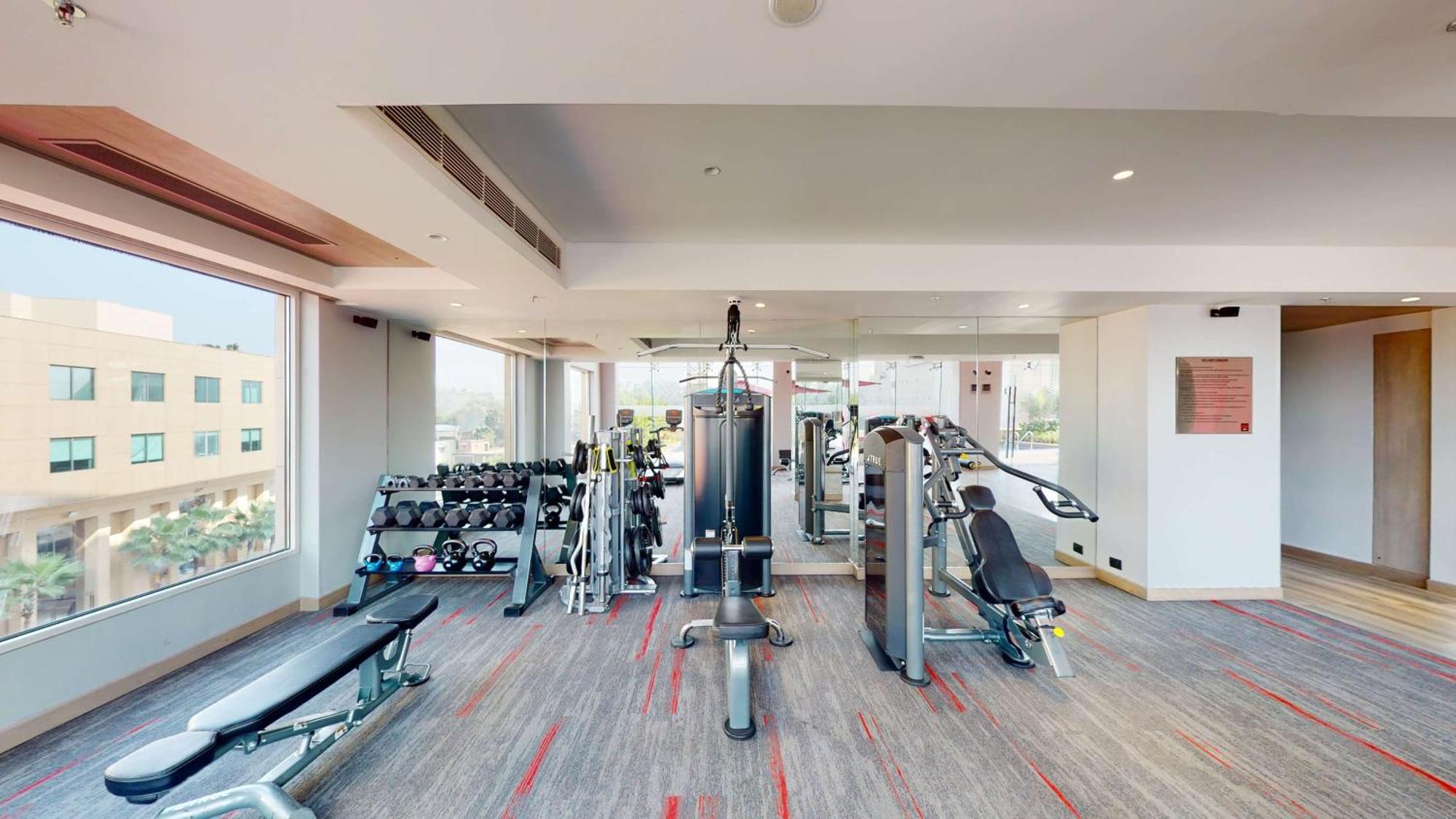Radisson Red Chandigarh Mohali Exterior photo The gym at the hotel
